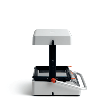 vaquform dt2 digital desktop vacuum former machine from left side view with the handle bar in a lowered position