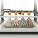 elegoo orangestorm giga 3d printer with four nozzles from front view