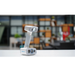 shining 3d einscan h2 scanner on a white table from front left side view with a blurred background