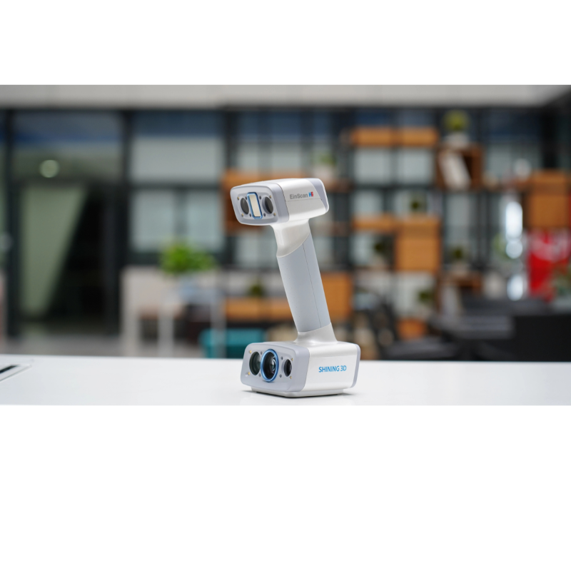 shining 3d einscan h2 scanner on a white table from front right side view with a blurred background