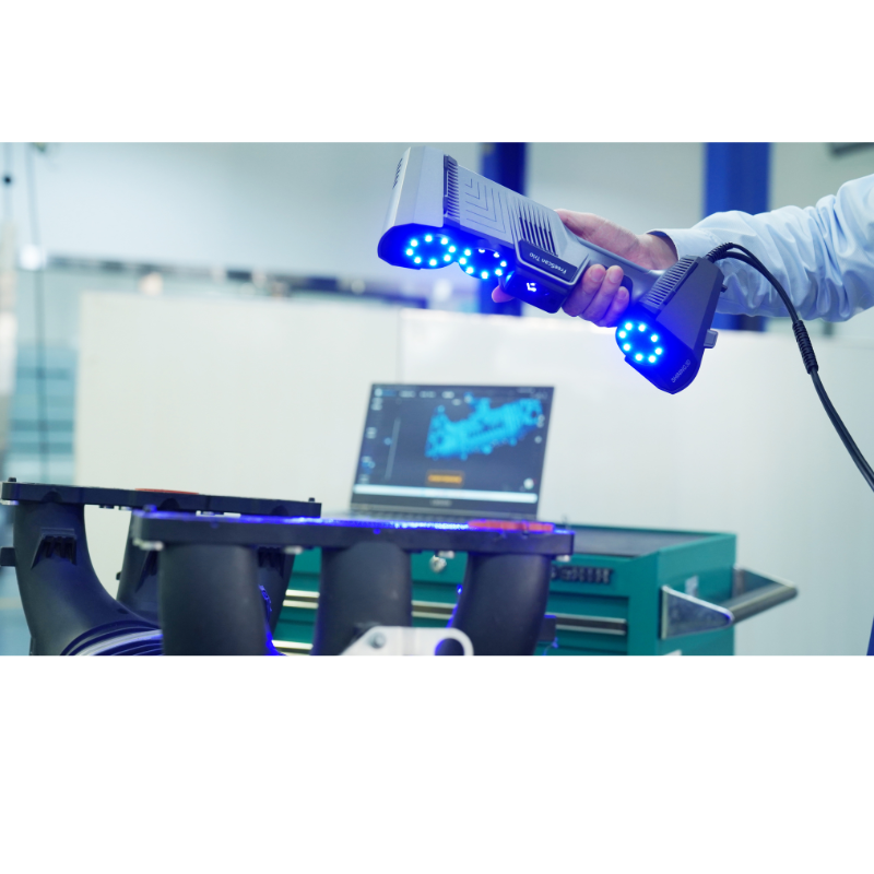 freescan trio laser 3d scanner pointing horizontally downward in the machine from front right side view