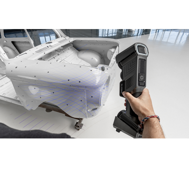 freescan trio laser 3d scanner pointed at top left of the car with blue grid lines