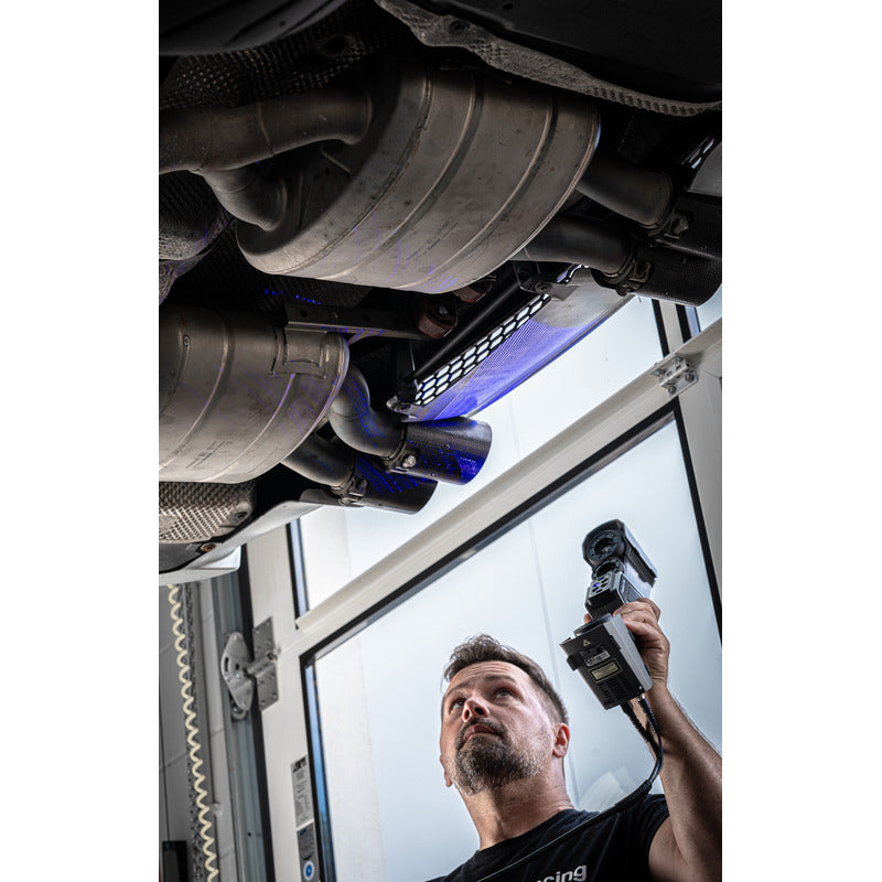 free scan trio laser 3d scanner in use by a person scanning the bottom of a car