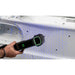 free scan trio laser 3d scanner from rear view tilted to the right scanning a white metal material