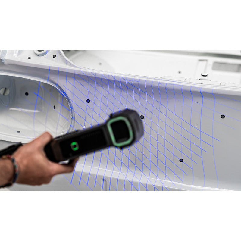 free scan trio laser 3d scanner from rear view tilted to the right scanning a white metal material