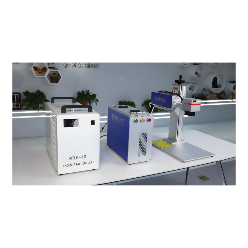 gweike g7 uv laser engraver and source with water chiller on a tabletop in a showroom