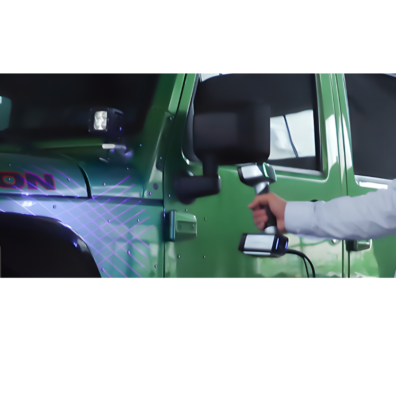 shining 3d einscan hx handheld scanner is being used on the left side of green car
