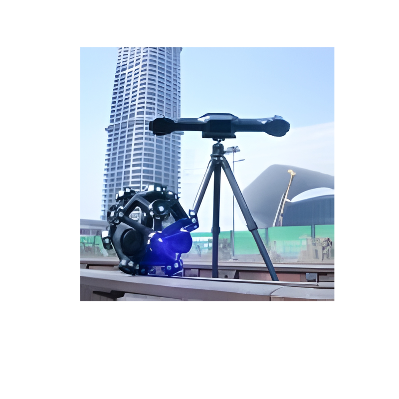 low angle view of shining 3d freescan trak nova wide range laser and dynamic tracking scanner with an outdoor background