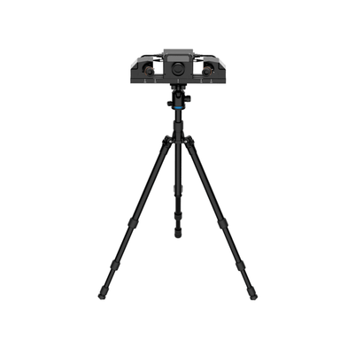 shining 3d transcan c scanner mounted on a tripod from front view with the camera positioned in a larger outer perspective