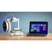 tiertime up plus 2 3d printer positioned to the left of a dark grey laptop on a light wooden table