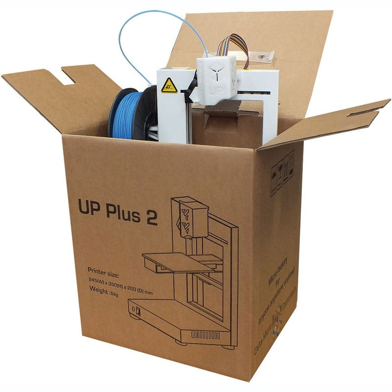 tiertime up plus 2 3d printer in an opened cardboard box from a front right side view