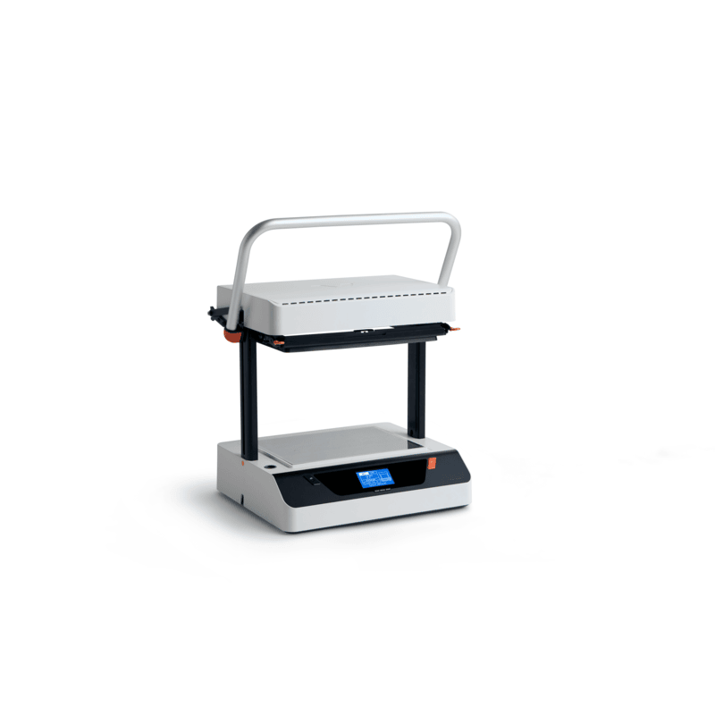 isometric view of the vaquform dt2 digital desktop vacuum former machine with blue lit screen