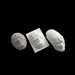 high angle view of masks created using the vaquform dt2 digital desktop vacuum former machine on a black background
